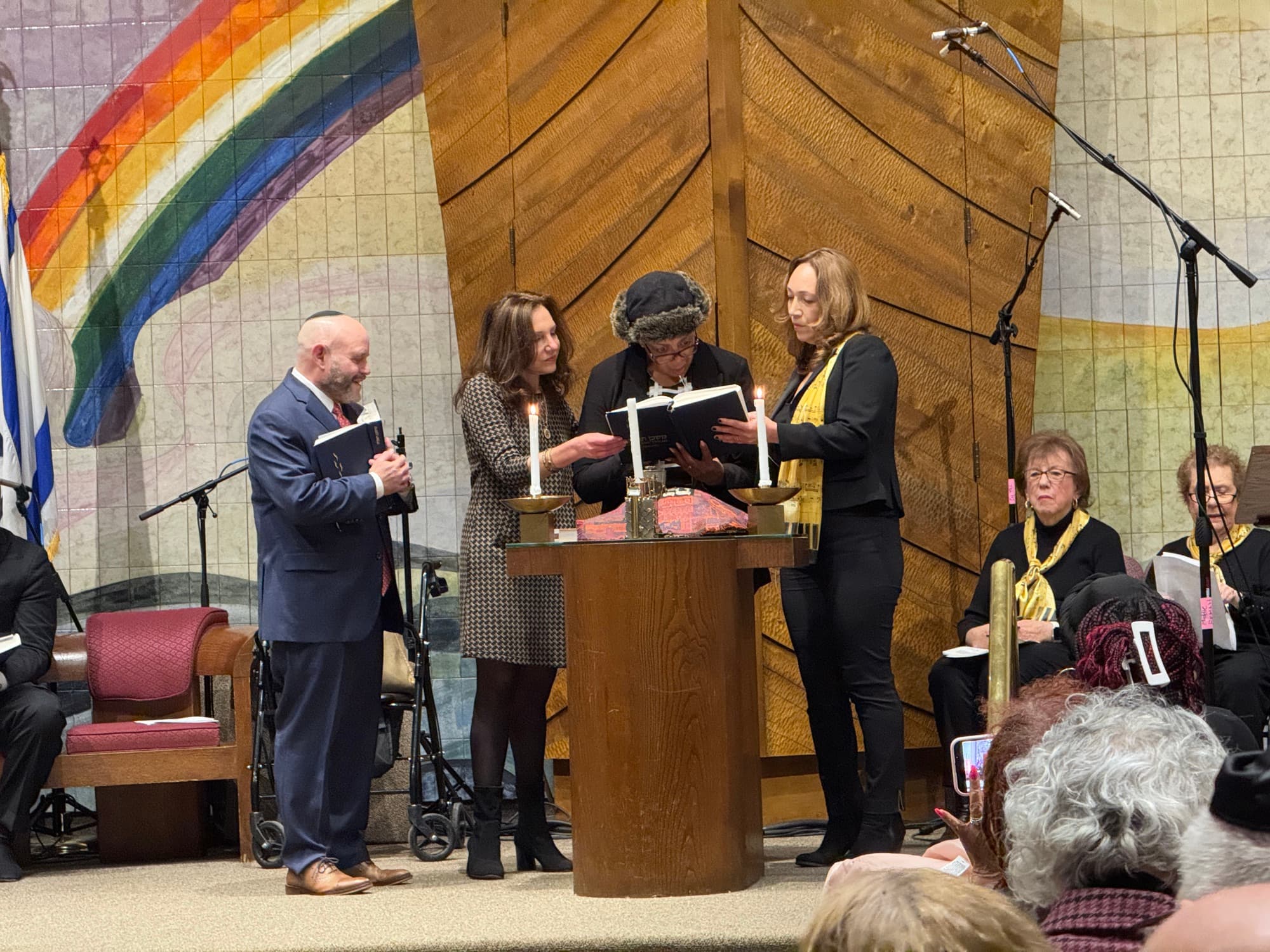 Interfaith candle lighting ceremony on the bimah at Temple Beth Sholom
