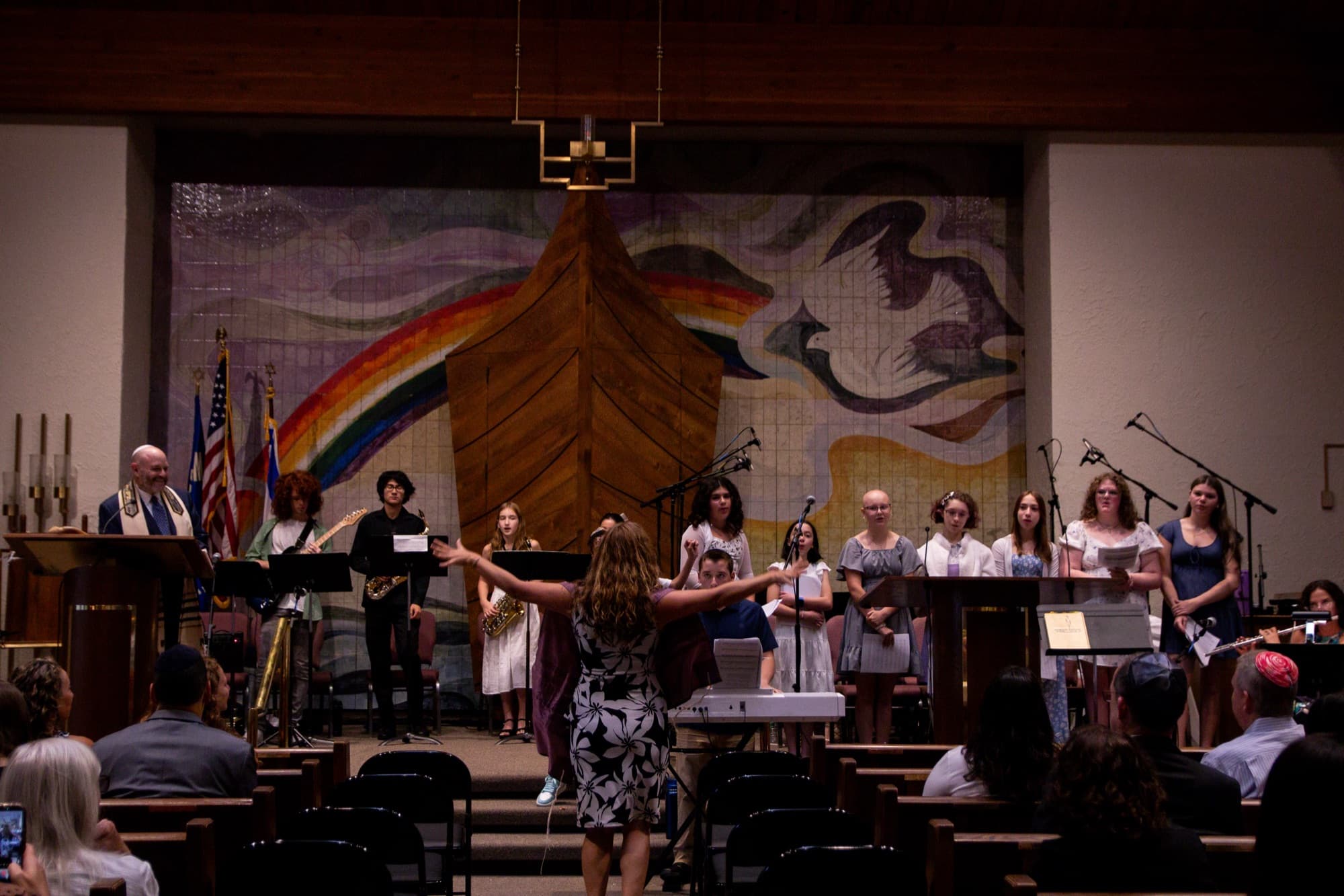 The TBS choir performing during a holiday celebration
